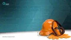 construction gear in front of a brick wall